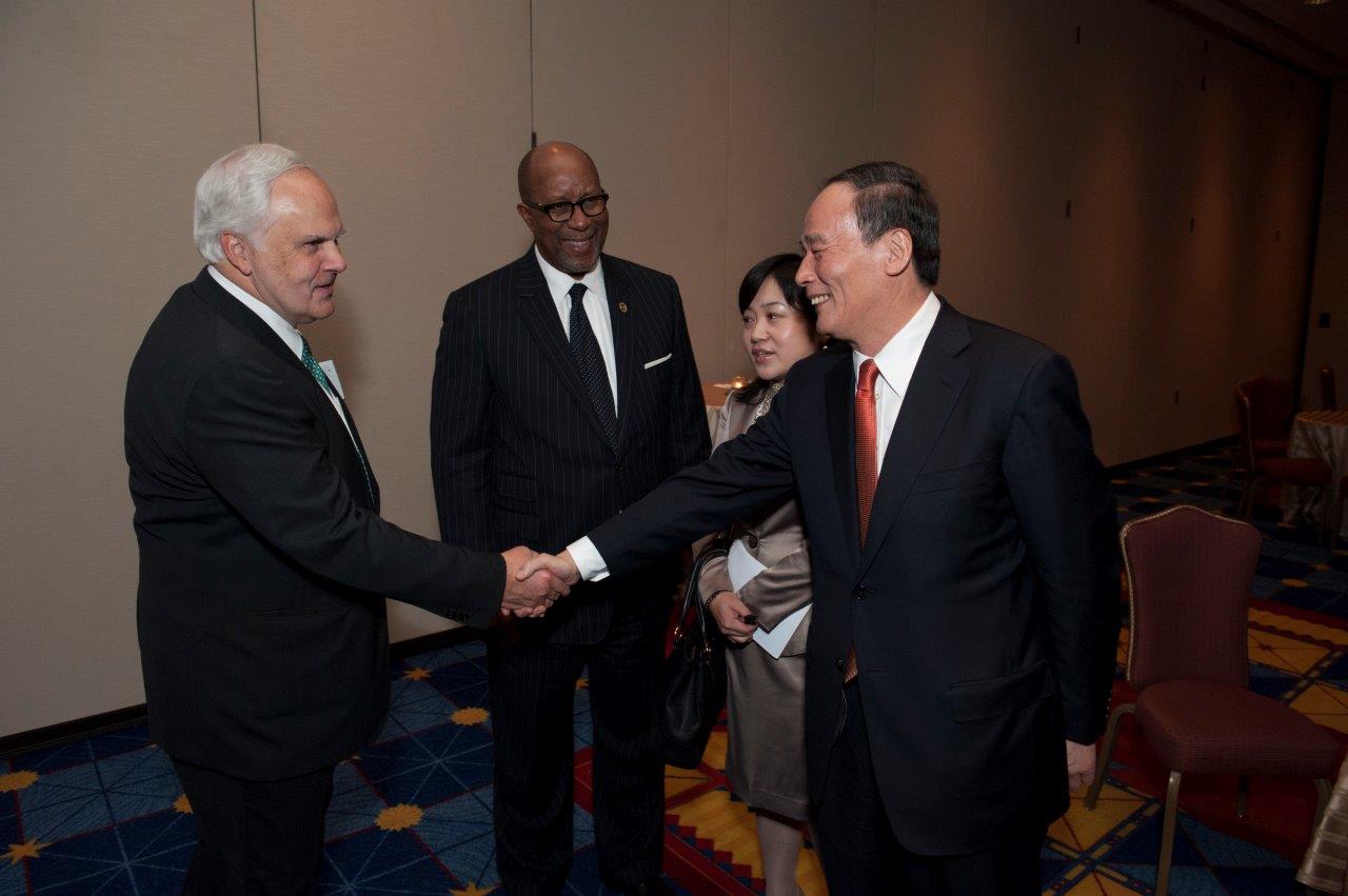 FedEx Corporation Chairman and CEO Frederick Smith, United States Trade Representative Ron Kirk, and Vice Premier Wang at the Dec. 19 dinner.