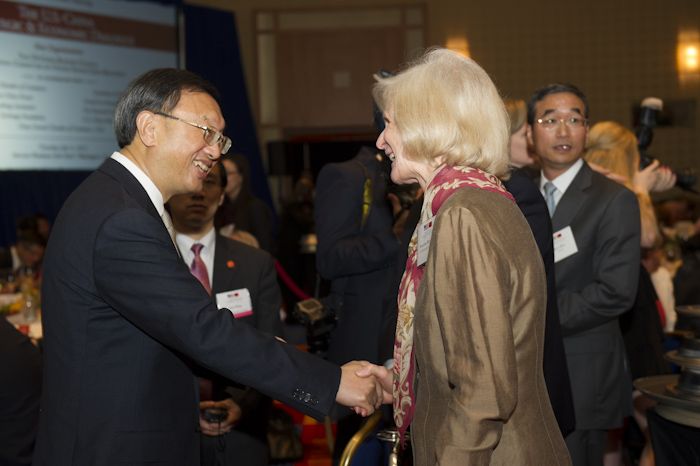 State Councilor Yang Jiechi greets dinner guests at the event. State Councilor Yang Jiechi greets dinner guests at the event.