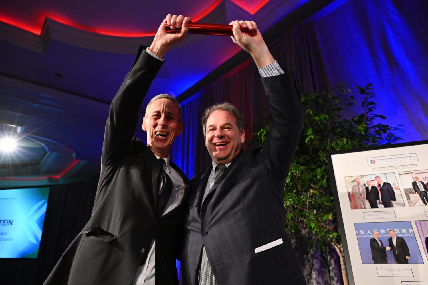 Outgoing USCBC President Craig Allen hands the baton to incoming President Sean Stein at USCBC's annual gala in 2024.