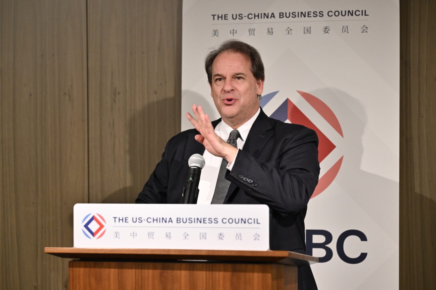 USCBC president speaks in front of podium